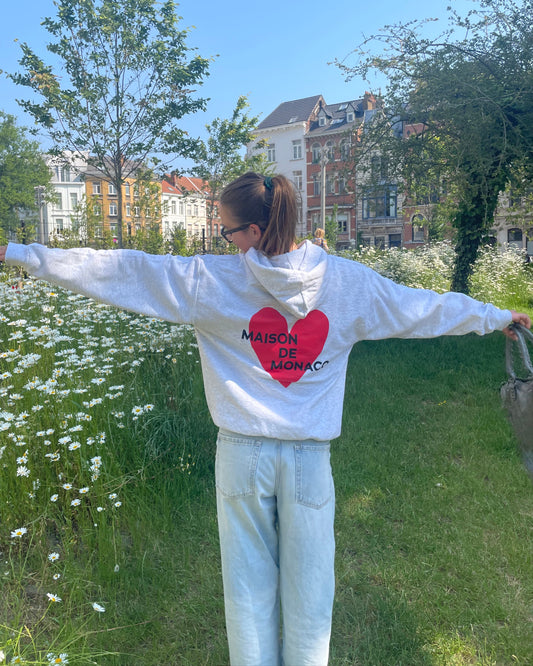 Le sweat à capuche Amore