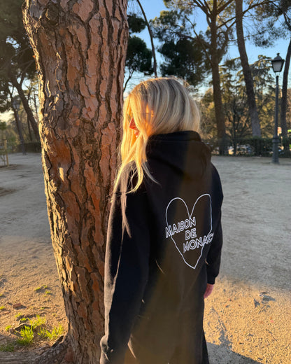 Le sweat à capuche noir Amore