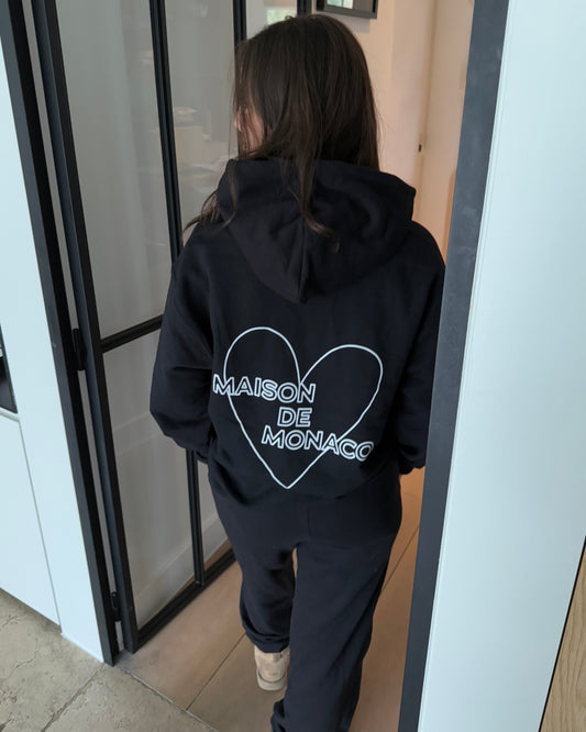 Le sweat à capuche noir Amore
