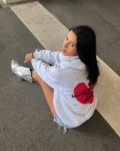 Le sweat à capuche Amore