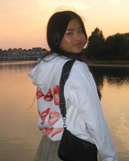 Le sweat à capuche Lucky Lips