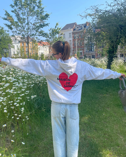 Le sweat à capuche Amore