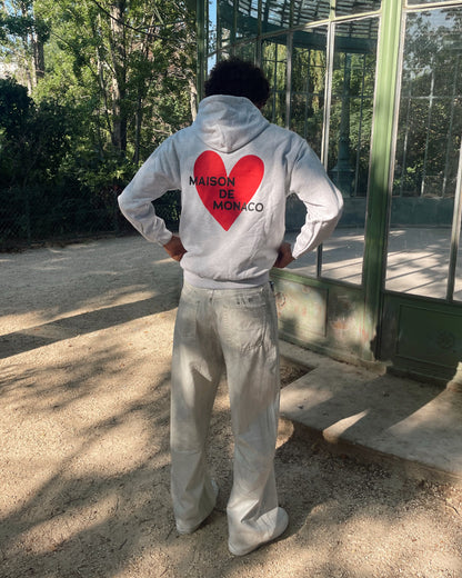 Le sweat à capuche Amore