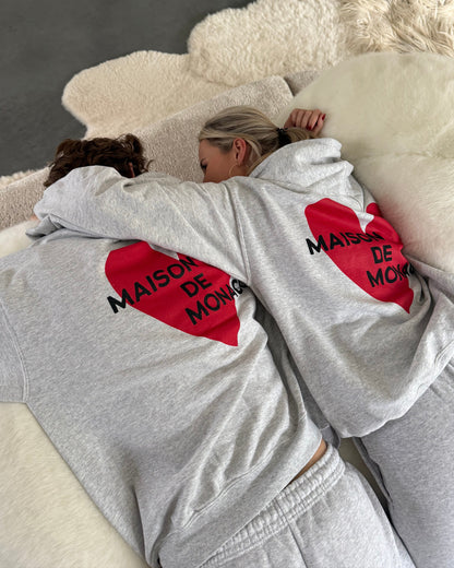 Le sweat à capuche Amore
